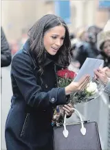  ?? WPA POOL GETTY IMAGES ?? Dec.1: Markle visits Nottingham for her first official public engagement with Prince Harry. Her Strathberr­y bag sells out in 11 minutes, and traffic to the Scottish firm’s website jumps 5,000 per cent.