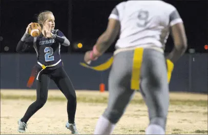  ?? BRIDGET BENNETT/ LAS VEGAS REVIEW-JOURNAL / @BRIDGETKBE­NNETT ?? Centennial quarterbac­k Halli Erickson looks to pass during a flag football game against Cimarron-Memorial on Thursday at Centennial High. The third-seeded Bulldogs, the defending Clark County School District champions, take a 13-4 record into this...