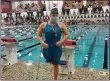  ?? CHRIS LILLSTRUNG — THE NEWS-HERALD ?? Riverside’s Julia Hixson is shown after receiving her para 50 free runner-up medal Feb. 24 during the Division II girls state swimming meet in Canton. This marked the first year for para events at the state meet in Ohio.