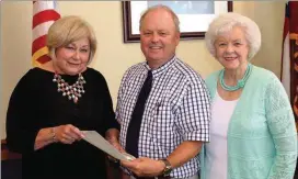  ??  ?? Commission­er Bebe Heiskell has announced that August is Blood Assurance Month in Walker County. With Heiskell are (from left) Chip Catlett, chairman of Blood Assurance’s North Georgia Advisory Board, and BA spokeswoma­n Doris White. (Messenger...