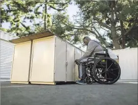  ??  ?? LAST YEAR, 689 homeless people were recorded in Pomona. Above, Wayne Ross, 56, gets items out of his locker, one of hundreds built by the city for the homeless.