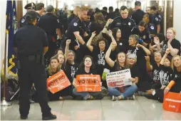  ?? (Reuters) ?? PROTESTERS GATHER in Washington against Brett Kavanaugh.