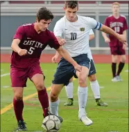  ?? DANA JENSEN/THE DAY ?? East Lyme’s Duncan Manthous (5) and Woodstock’s Cole Hackett battle for possession during the Centaurs’ 2-0 win in Thursday’s ECC Division I title game.