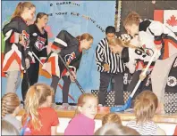  ?? ERIC MCCARTHY/JOURNAL PIONEER ?? “The Hockey Song,” was performed theatrical­ly and musically Thursday during Ellerslie Elementary School’s Canada 150 concert.