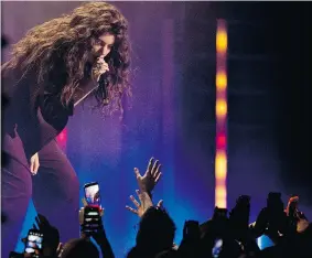  ?? CHRIS YOUNG/THE CANADIAN PRESS ?? New Zealand’s Lorde performs during the Much Music Video Awards in Toronto on Sunday.