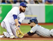  ?? FRaNK GUNN/THE CANADIAN PRESS/FILES ?? The Jays would like to unload Russell Martin and his US$20-million salary at the MLB winter meetings.