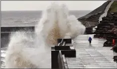  ??  ?? WILD SEA: Huge waves slam into Blackpool north shore
