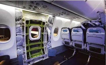  ?? Lindsey Wasson/Associated Press file photo ?? A door plug area of an Alaska Airlines Boeing 737 Max 9, with paneling removed, prior to inspection at Seattle-Tacoma Internatio­nal Airport on Jan. 10 in SeaTac, Wash. Air safety in general and concerns about Boeing-made planes in particular have been on the minds of many since January, when a panel covering an emergency door hole blew off an Alaska Airlines plane flying 16,000 feet above Oregon.