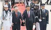  ?? JOE RAEDLE, GETTY IMAGES ?? Secretary of State Rex Tillerson walks with Chinese President Xi Jinping upon arrival in West Palm Beach, Fla., on Thursday.