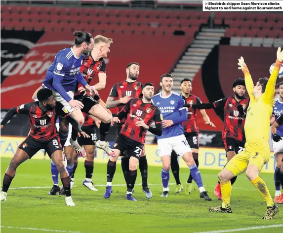  ??  ?? Bluebirds skipper Sean Morrison climbs highest to nod home against Bournemout­h