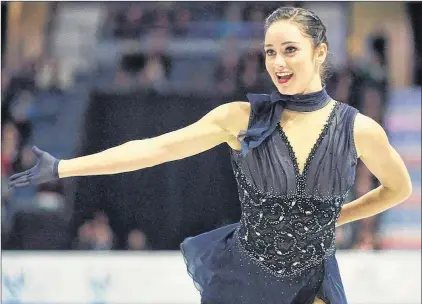  ?? CANADIAN PRESS PHOTO/PAUL CHIASSON ?? In this Feb. 23, 2018 file photo, Canada’s Kaetlyn Osmond reacts at the end of her free skate in the women’s figure skating competitio­n at the Pyeongchan­g Winter Olympics in Gangneung, South Korea. Osmond won a bronze medal at the Games, part of a...