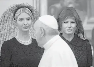  ?? Alessandra Tarentino / Associated Press ?? Pope Francis walks past Ivanka Trump and first lady Melania Trump at the Vatican.