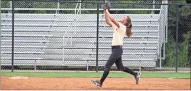  ?? / Kevin Myrick ?? The Rockmart Lady Jackets grabbed fly balls in the in and outfield during batting practice, which also served as catching practice as well ahead of rain showers moving into the area on Monday, July 30.