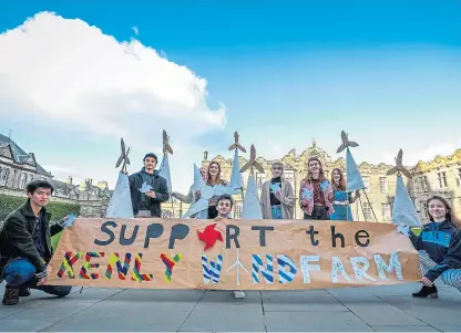  ?? Picture: Steve Brown. ?? From left: Lea Weiman, Kayleigh Dearstwyne-Hulin, Long Tran, Catherine Bentley, Adam Polanek, Jessey Reid, Monica Gregory, Kristina Kumpf and Kaitlin Ridway from Amnesty St Andrews show their support for Kenly wind farm.