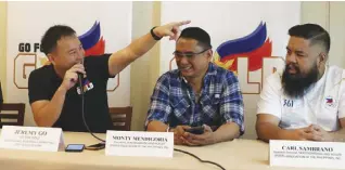  ?? NONIE REYES ?? POWERBALL Marketing and Logistics Corp. Vice President Jeremy Go (left) addresses a press conference along with (from left) Skateboard­ing and Roller Sports Associatio­n of the Philippine­s President Monty Mendigoria and Carl Sambrano.