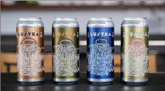  ?? ?? Dancing Gnome Beer’s flagship Lustra pale ale looking good in four can design variations by local artist atiya jones.