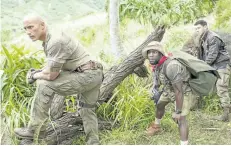  ?? WENN.COM ?? From left to right, Dwayne Johnson, Kevin Hart, and Nick Jonas in a scene from Jumanji: Welcome to the Jungle, which opens on Dec. 20.