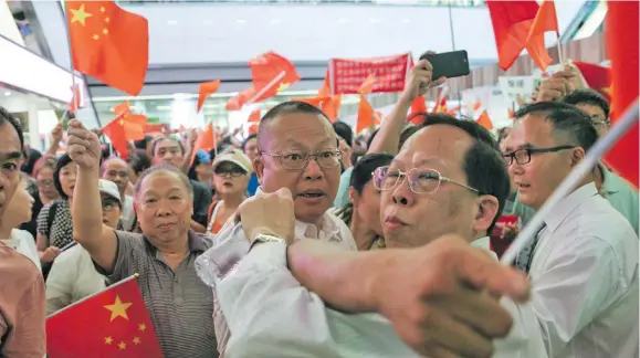  ?? Photo: AAP ?? Shopping malls have become a site for confrontat­ions between pro-China supporters and pro-Hong Kong supporters.