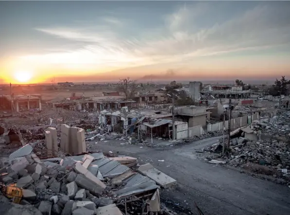  ??  ?? AD: This is Sinjar, the morning of 15 November 2015. The previous day it had been ‘liberated’ by the Peshmerga (Kurdish forces). I was shooting with both a Canon Mark II and a Mark III. I don’t really work with a tonne of lenses in general. I had my favourites: a 24–70mm on one and a 35mm on the other.