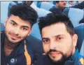  ??  ?? Suresh Raina’s selfie with rookie Rishabh Pant.