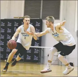  ?? The Sentinel-Record/Grace Brown ?? MOVING FORWARD: Nighthawk sophomore Seth Duke, left, drives the lane as Henderson State transfer Preston Crowder defends during practice Monday at National Park College’s gymnasium. The Nighthawks open their season Nov. 5 at home against Cossatot Community College at 7 p.m.