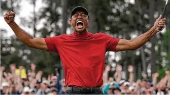 ?? David J. Phillip / Associated Press ?? With his 15th major title, Tiger Woods now is just three behind Jack Nicklaus and again back in the hunt.