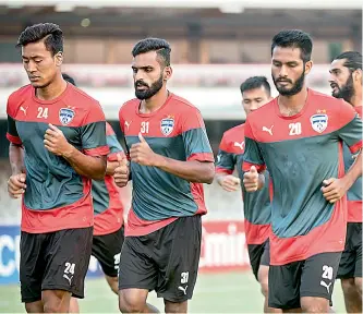  ?? — DC ?? Bengaluru FC players in training at the Bangabandh­u National Stadium, in Dhaka on Tuesday.