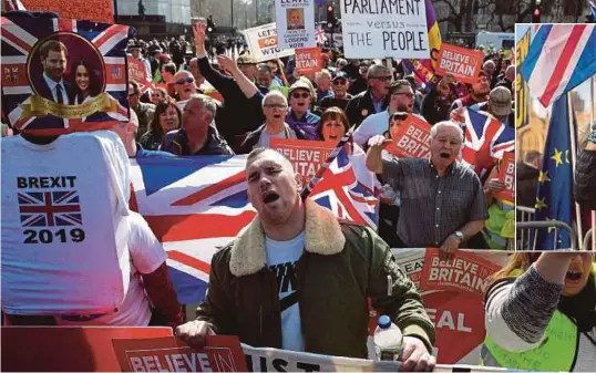  ?? AGENCIES PIX ?? Pro-Brexit demonstrat­ors carrying placards and Union Jack flags as they gather in Parliament Square in central London yesterday. (Inset) ‘Stop Brexit’ campaigner Steve Bray protesting outside of the Houses of Parliament in London on Thursday.