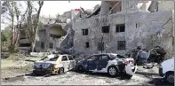  ?? AP PHOTO ?? TEWASKAN PULUHAN KORBAN: Foto rilisan kantor berita Syria, SANA, menunjukka­n dua mobil yang rusak akibat bom bunuh diri di Damaskus.