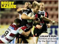  ??  ?? LOGAN’S RUN: Tomkins in action for the Red Devils