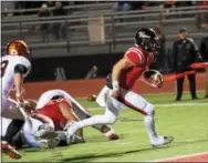  ?? MICHAEL REEVES — FOR DIGITAL FIRST MEDIA ?? Coatesvill­e’s Ricky Ortegawalt­zes into the end zone Friday night against Pennsbury.