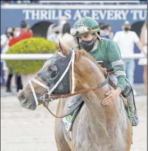  ?? The Associated Press ?? Known Agenda, with Irad Ortiz Jr. up, won the Florida Derby by 2¾ lengths, covering the 1⅛ miles in 1 minute, 49.45 seconds.