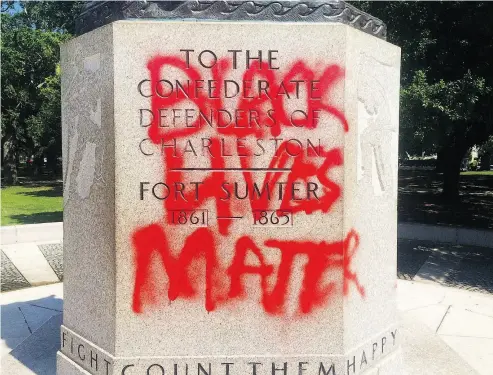  ?? PHILIP WEISS / WCSC-TV / THE ASSOCIATED PRESS FILES ?? A statue memorializ­ing the Confederac­y is spray-painted in Charleston, S.C. Author Francis Fukuyama argues the Black Lives Matter movement, among others, is “built around real abuses that (need) to be corrected.”