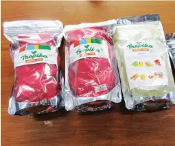  ??  ?? VALUE-ADDING – The vegetable flour produced by Sandy Montano is a means to add value to processed food products. For instance, the two pouches at left are “polvoron” which are of much better quality than others that are locally available in the market. The next pouch is that of the Tropica flour. At extreme right is the chocolate energy bar which is the favorite of Sandy Montano.