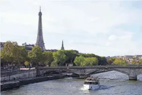  ?? JERRY LAI/USA TODAY SPORTS ?? General view on Oct. 22, 2022, of the Eiffel Tower and the Seine river, as seen from Pont Alexandre III, in advance of the Paris Games.