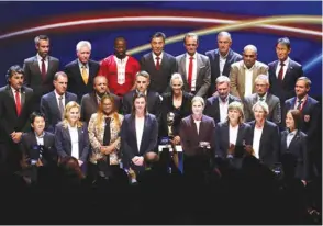  ?? (Reuters) ?? Managers pose for a photograph after the 2019 FIFA Women’s World Cup draw in Paris.