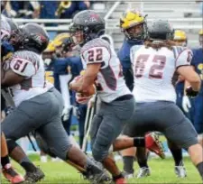  ?? GREGG SLABODA — TRENTONIAN PHOTO ?? Allentown’s Rahsaan Emory (22) carries the ball against Nottingham on Saturday.