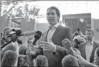  ?? The Associated Press ?? AUSTRIAN ELECTION: Foreign Minister Sebastian Kurz, head of Austrian People's Party, talks to the media Sunday after casting his vote in Vienna, Austria.