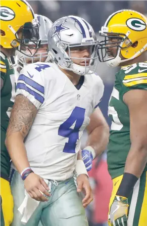  ?? (Photo by Michael Ainsworth, AP file) ?? Dallas Cowboys quarterbac­k and former Mississipp­i State player Dak Prescott walks away after a play during the first half of an NFL divisional playoff game against the Green Bay Packers in Arlington, Texas. For decades, dating back to Lombardi and...