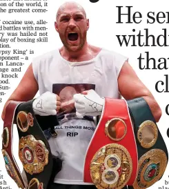  ??  ?? KING OF THE RING: Boxer Tyson Fury showing off three world title belts