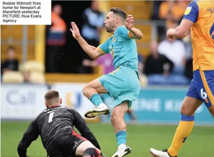  ??  ?? Robbie Willmott fires home for Newport at Mansfield yesterday PICTURE: Huw Evans Agency
