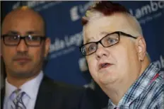  ?? David Zalubowsk/Associated Press ?? Dana Zzyym, right, the plaintiff in a federal discrimina­tion lawsuit filed against the State Department seeking more gender options for passports, speaks next to attorney Paul D. Castillo during a news conference in October 2016.