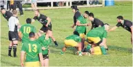  ??  ?? Halfback Turango Karena clears the ball as Aotea attacks close to the line.