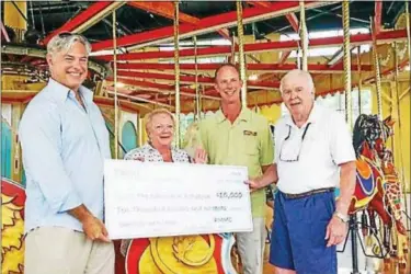  ?? SUBMITTED PHOTO ?? From left, Richard Newell, CEO of Pottstown Memorial Medical Center, Bev Reber, vice president of The Carousel at Pottstown, Matt Shelak, COO of Pottstown Memorial Medical Center and George Wausnock, president of Carousel