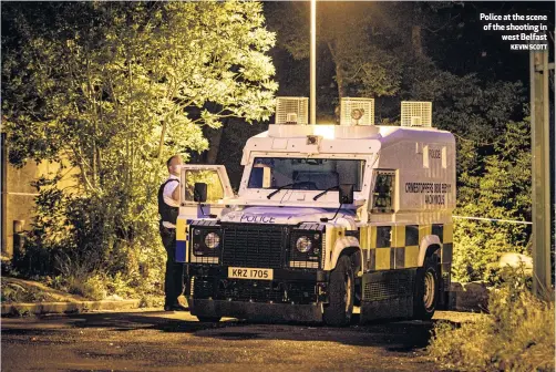  ?? KEVIN SCOTT ?? Police at the scene of the shooting in
west Belfast