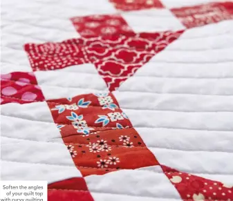  ??  ?? Soften the angles of your quilt top with curvy quilting