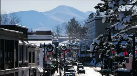  ?? THE LAKE PLACID HOLIDAY VILLAGE STROLL ?? Several inns and hotels in Lake Placid, N.Y. are offering discounts on the Dec. 7-9 weekend during the annual Lake Placid Holiday Village Stroll.