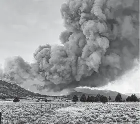  ?? U.S. Forest Service via Associated Press ?? A U.N. report finds climate change already presents a crisis with extreme droughts, heat waves, flooding and wildfires like this one Thursday in Oregon.