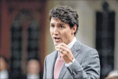  ?? CP PHOTO ?? Prime Minister Justin Trudeau rises during question period in the House of Commons on Parliament Hill in Ottawa on Wednesday.