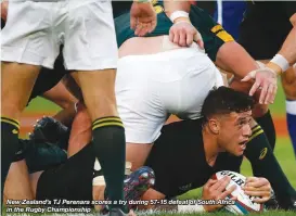  ??  ?? New Zealand’s TJ Perenara scores a try during 57-15 defeat of South Africa in the Rugby Championsh­ip